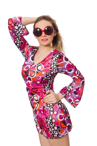 Mooi meisje in jurk met roze prints geïsoleerd op wit — Stockfoto