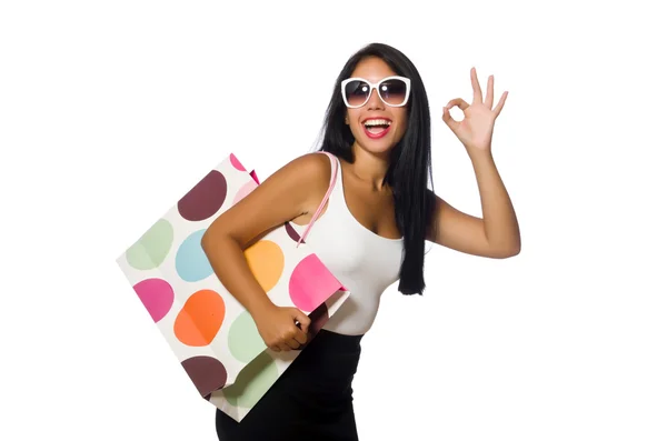 Kvinna med shoppingväskor på vitt — Stockfoto