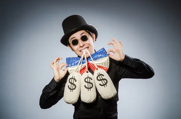 Funny man with money dollar sacks — Stock Photo, Image