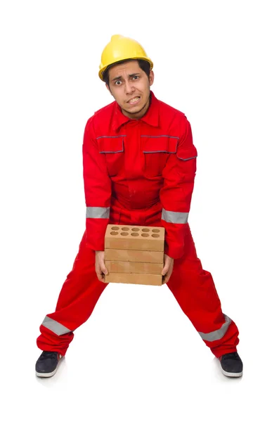 Construction worker with clay bricks on white — Stock Photo, Image