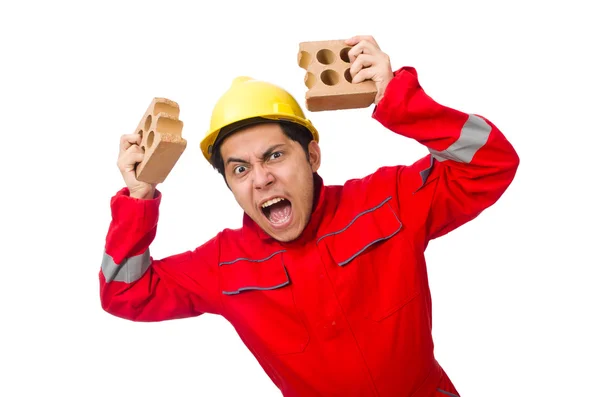 Trabajador de la construcción con ladrillos de arcilla en blanco — Foto de Stock