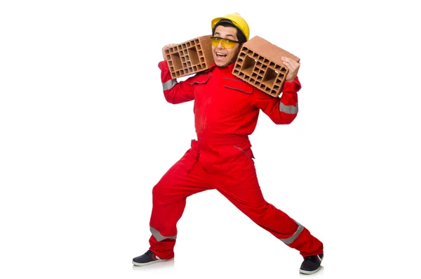 Construction worker with clay bricks on white — Stock Photo, Image