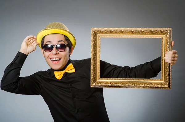 Funny man with picture frame — Stock Photo, Image