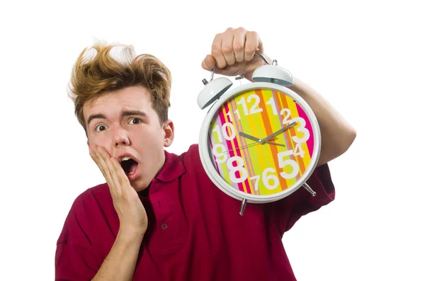 Estudiante con reloj despertador aislado en blanco — Foto de Stock