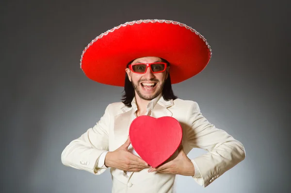 Person som bär sombrero hatt i roligt koncept — Stockfoto