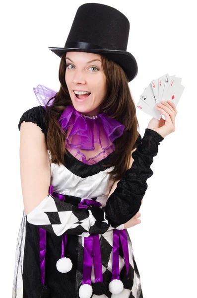 Jolie fille en costume de bouffon avec des cartes isolées sur blanc — Photo