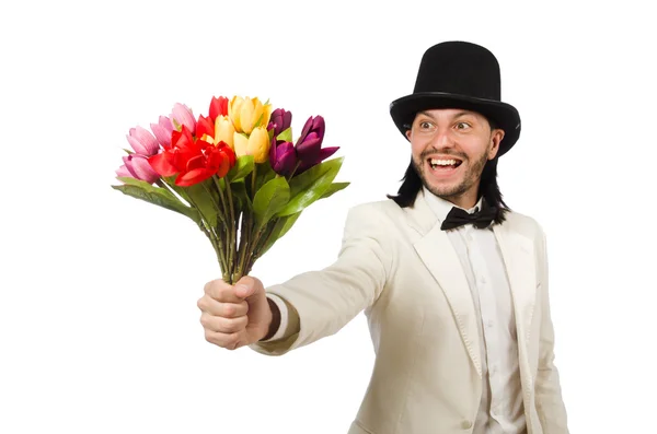 Hombre con flores de tulipán aisladas en blanco — Foto de Stock