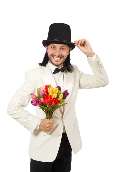 Uomo con fiori di tulipano isolato su bianco — Foto Stock