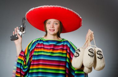 Girl in mexican poncho holding handgun and money sacks clipart