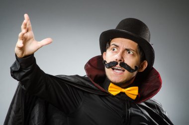 Funny magician man wearing tophat clipart