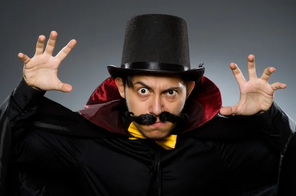 Funny magician man wearing tophat — Stock Photo, Image