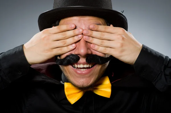 Funny magician man wearing tophat — Stock Photo, Image