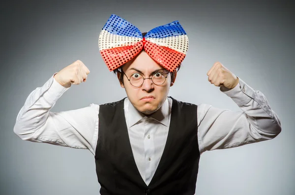 Funny man with giant bow tie — Stock Photo, Image