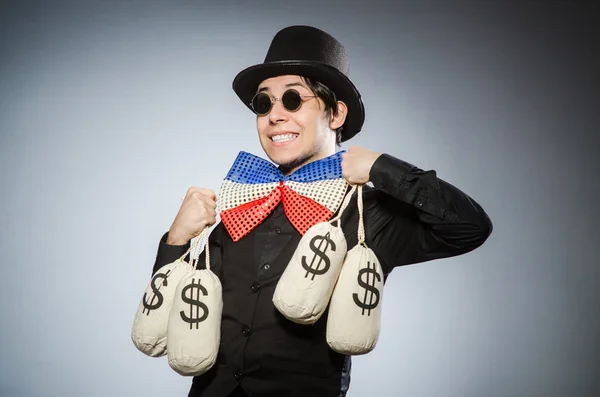 Grappige man met geld dollar zakken — Stockfoto