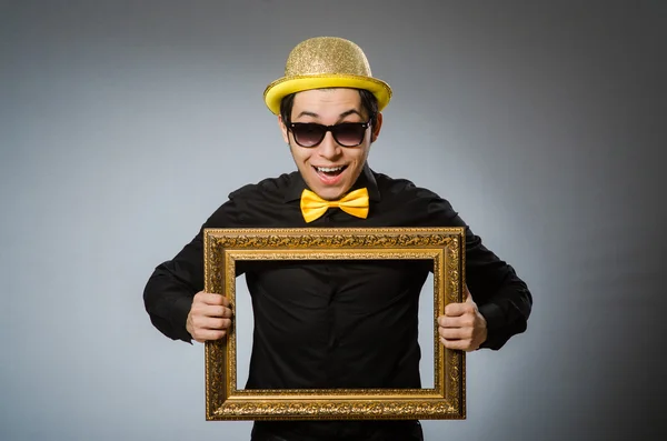 Funny man with picture frame — Stock Photo, Image