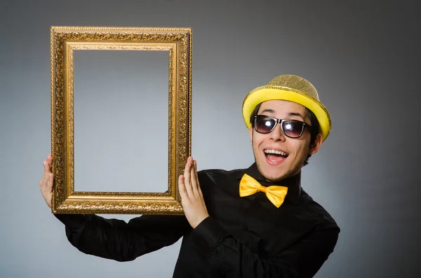 Funny man with picture frame — Stock Photo, Image