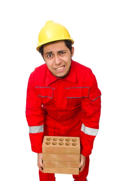 Trabajador de la construcción con ladrillos de arcilla en blanco — Foto de Stock