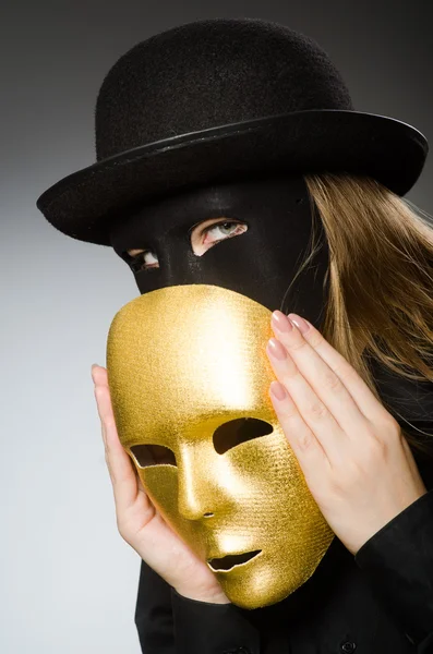 Woman with mask in funny concept — Stock Photo, Image