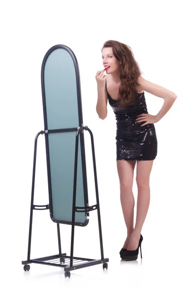 Woman in front of mirror — Stock Photo, Image