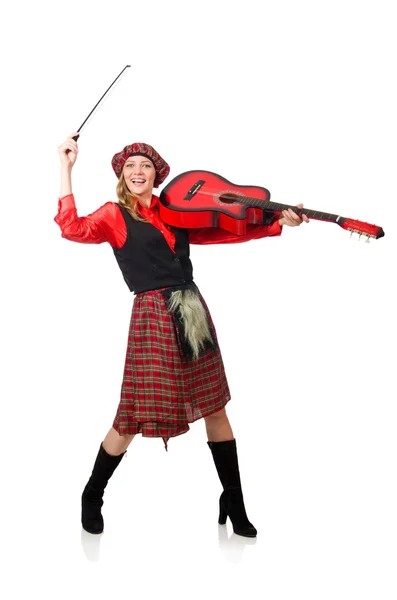 Lustige Frau in schottischer Kleidung mit Gitarre — Stockfoto