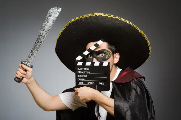 Person som bär sombrero hatt i roligt koncept — Stockfoto