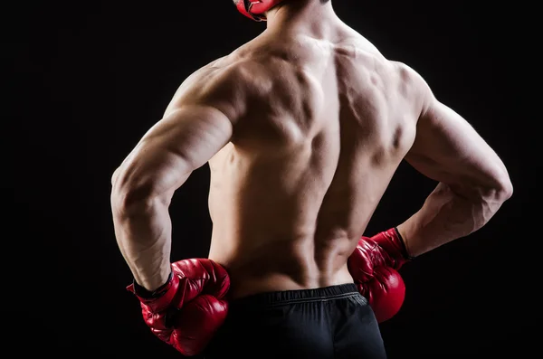 Homem muscular no conceito de boxe — Fotografia de Stock