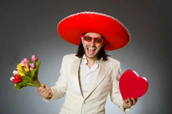 Persona que usa sombrero sombrero en concepto divertido — Foto de Stock