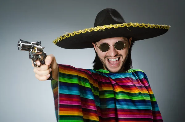 Mexican with gun wearing sombrero — Stock Photo, Image