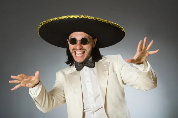 Person wearing sombrero hat in funny concept — Stock Photo, Image