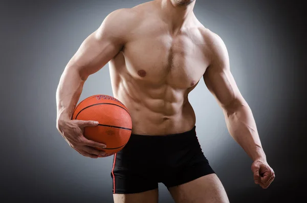 Muscular basketball in sports concept — Stock Photo, Image