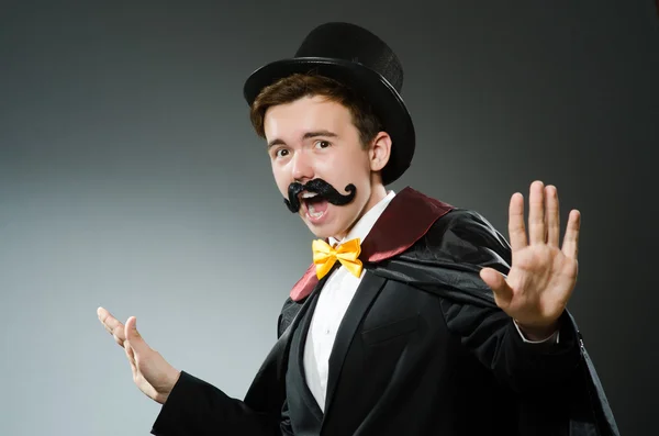 Funny magician man wearing tophat — Stock Photo, Image