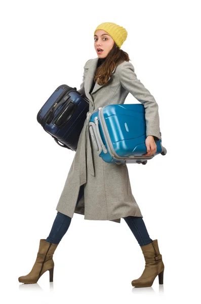 Kobieta z gotowy na zimowe wakacje walizka — Zdjęcie stockowe