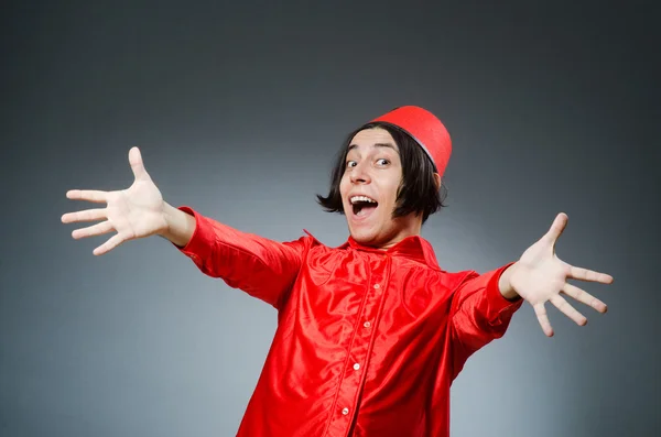 Man wearing red fez hat — Stock Photo, Image