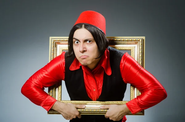 Man wearing red fez hat — Stock Photo, Image