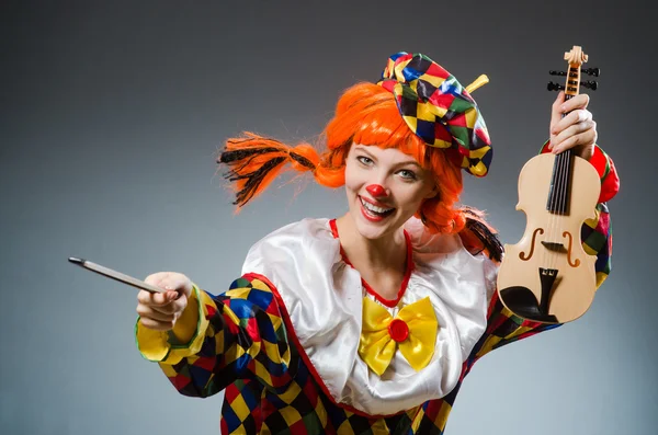 Clown in funny concept on dark background Royalty Free Stock Images