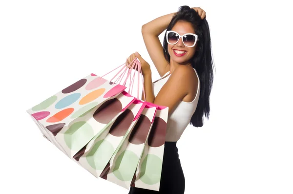 Femme avec sacs à provisions sur blanc — Photo