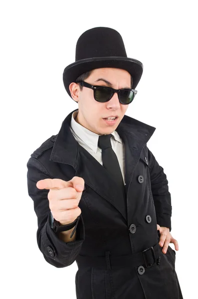 Giovane detective in cappotto nero isolato su bianco — Foto Stock