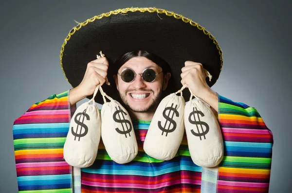 Hombre mexicano con sacos de dinero —  Fotos de Stock