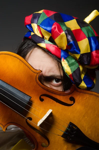 Funny violin clown player in musical concept — Stock Photo, Image