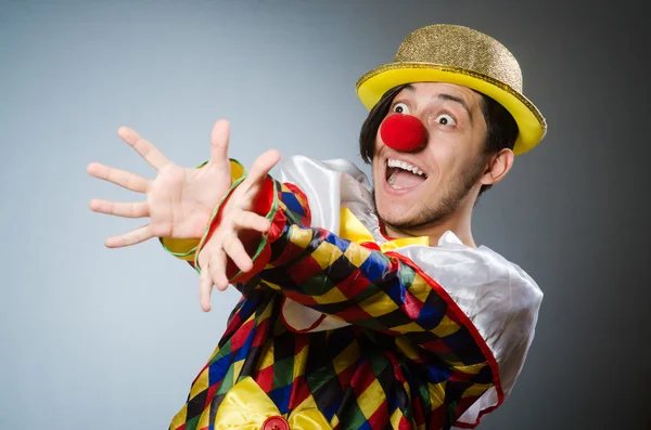 Funny clown against dark background — Stock Photo, Image