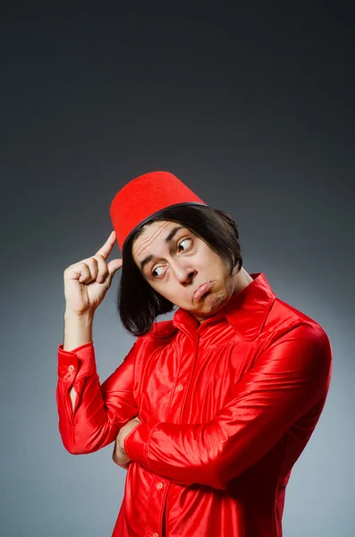 Man wearing red fez hat — Stock Photo, Image