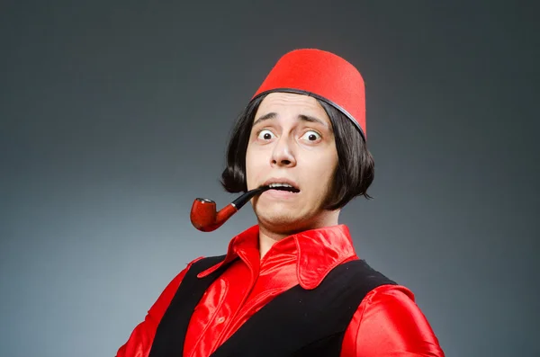 Man wearing red fez hat — Stock Photo, Image