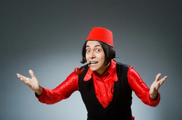 Homem usando chapéu vermelho fez — Fotografia de Stock