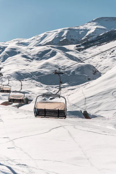 Ski lifts durings bright winter day — Stock Photo, Image