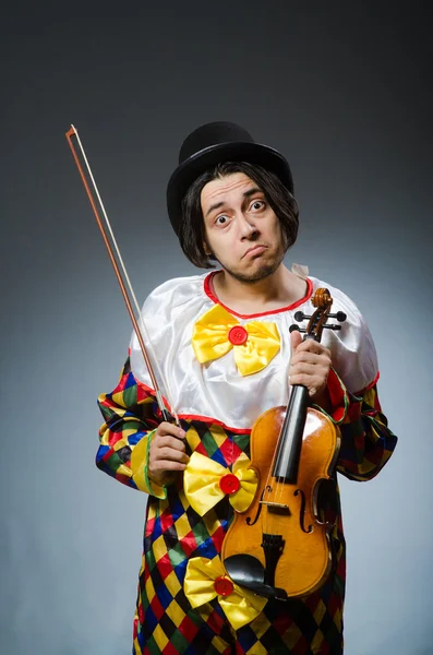 Funny violin clown player in musical concept — Stock Photo, Image