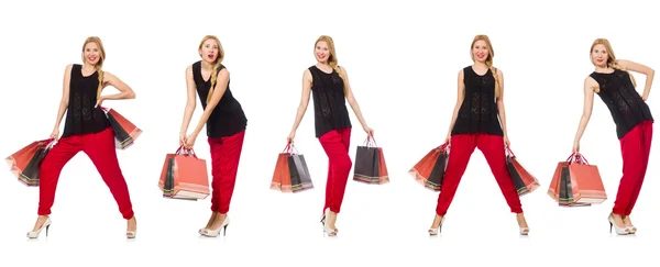 Ensemble de femme avec sacs à provisions sur blanc — Photo