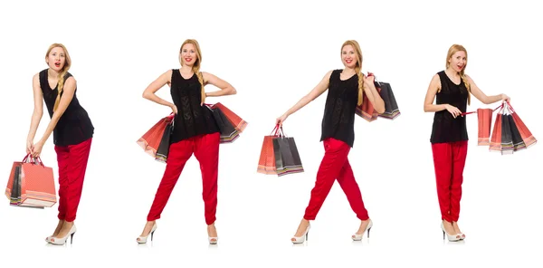 Ensemble de femme avec sacs à provisions sur blanc — Photo