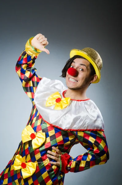 Funny clown against dark background — Stock Photo, Image