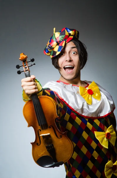 Funny violin clown player in musical concept — Stock Photo, Image