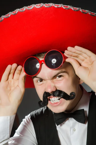 Person wearing sombrero hat in funny concept — Stock Photo, Image